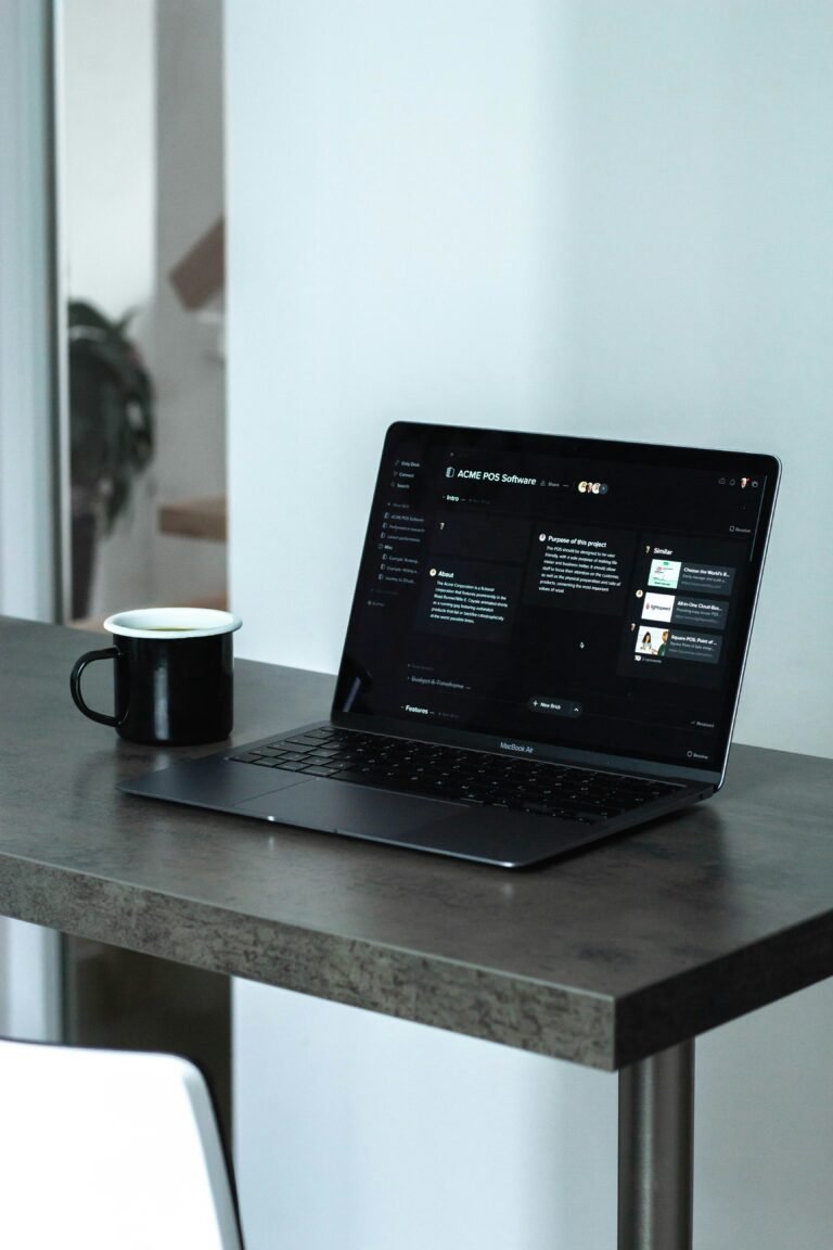 person working on laptop in a coffee shop making money online